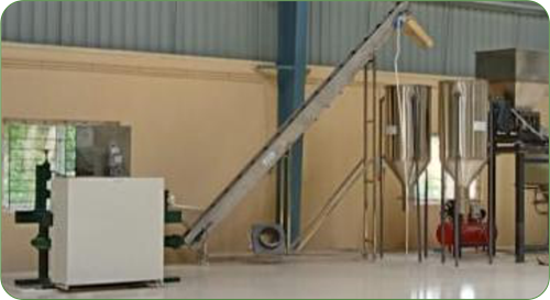Flaking line: flaking machine with an inclined conveyor and dryers