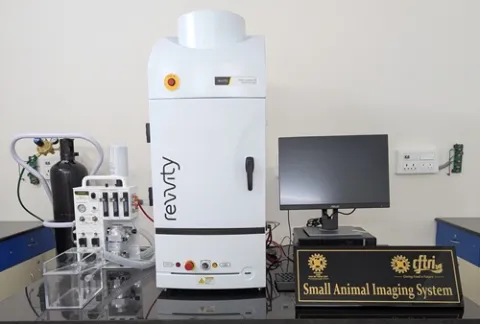 IVIS Lumina X5 in vivo imaging system with its anaesthesia unit and computer, labelled Small Animal Imaging System